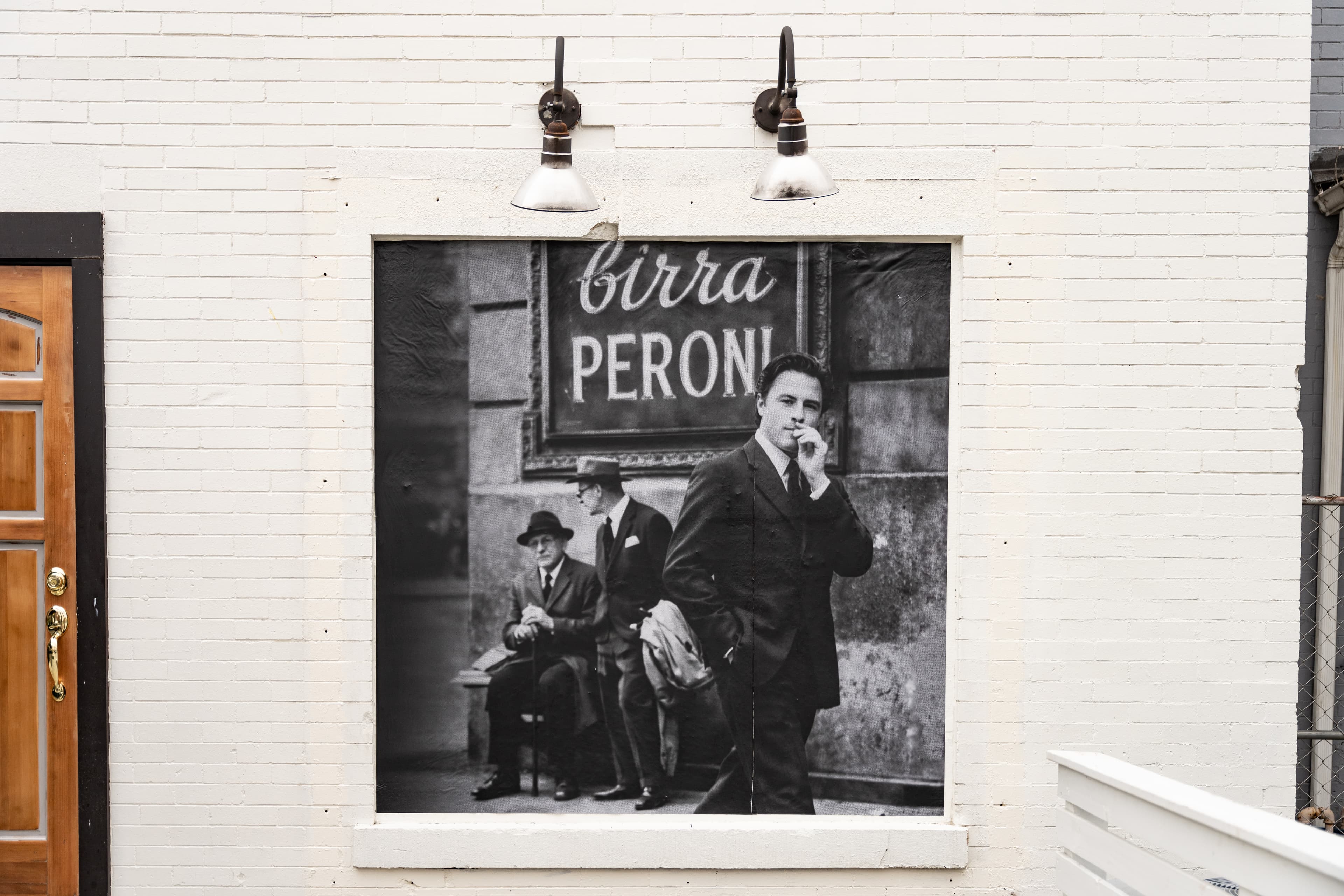 Vintage Italian photography on the wall at Ulivo